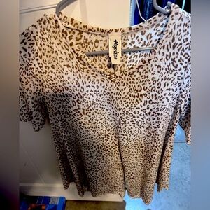 Short sleeve ladies top. Longer in length.